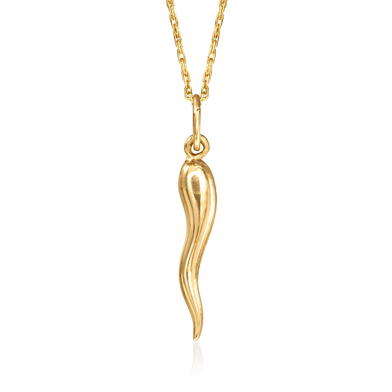 Yellow gold horn pendant necklace with slender chain, close-up
