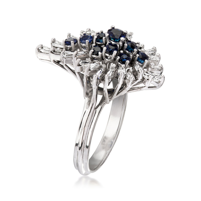 White gold ring with cluster of blue sapphires and baguette diamonds, side view