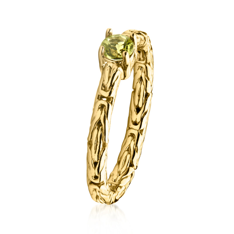 Gold Byzantine ring with square peridot-green gemstone, side view