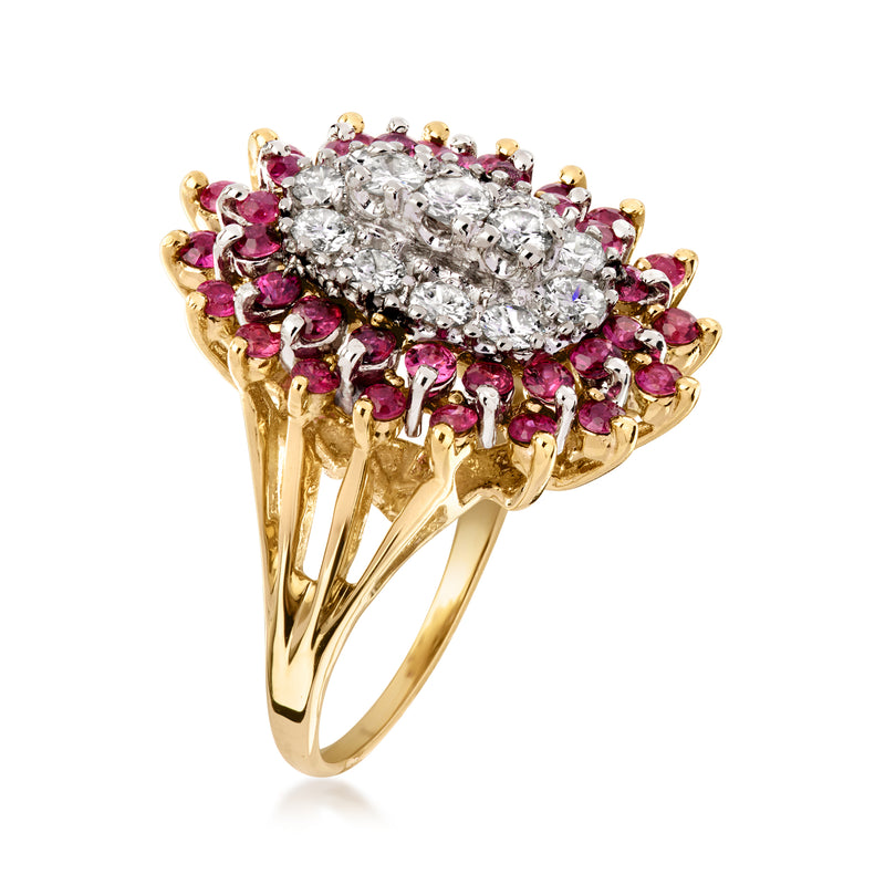 Oval diamond cluster ring in 14kt yellow gold with pink ruby side halo