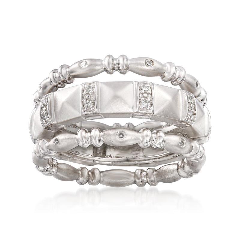 Sterling silver stackable eternity bands with three diamond-set rows, stacked together
