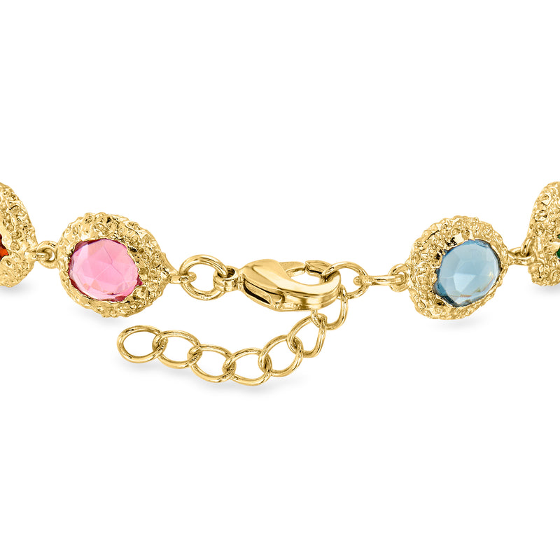 Gold-plated bracelet with pink and blue round gemstones, chain links, and toggle clasp