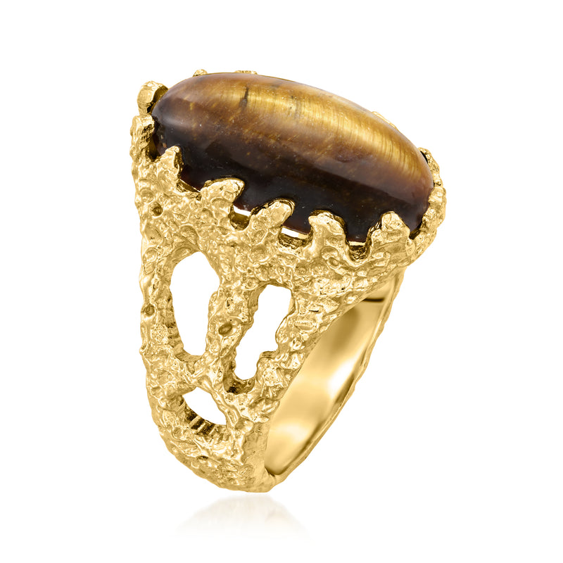 Gold-plated tiger eye ring with oval dark stone, ornate openwork setting