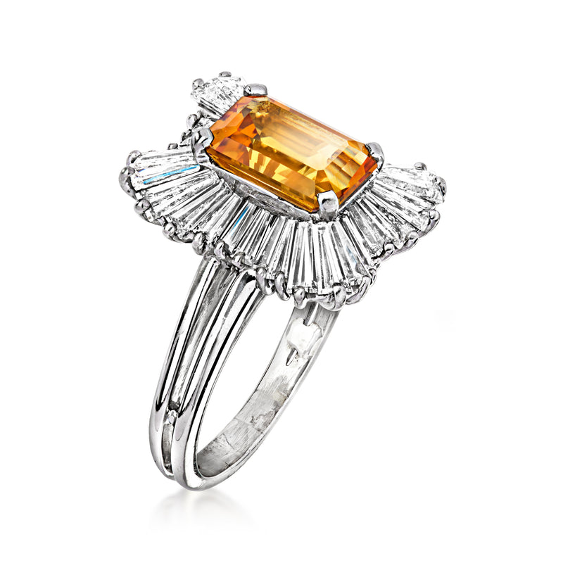 Platinum ring side view with rectangular citrine center and diamond baguette halo