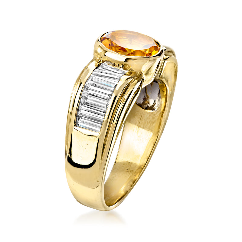 Yellow gold ring with oval citrine top and baguette diamond shoulders