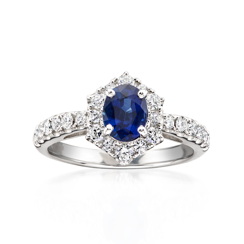 Vintage platinum sapphire ring with diamond halo and diamond band
