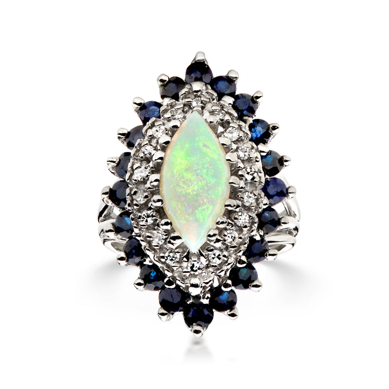 Opal and sapphire halo ring in 14kt white gold with teardrop opal center and diamonds
