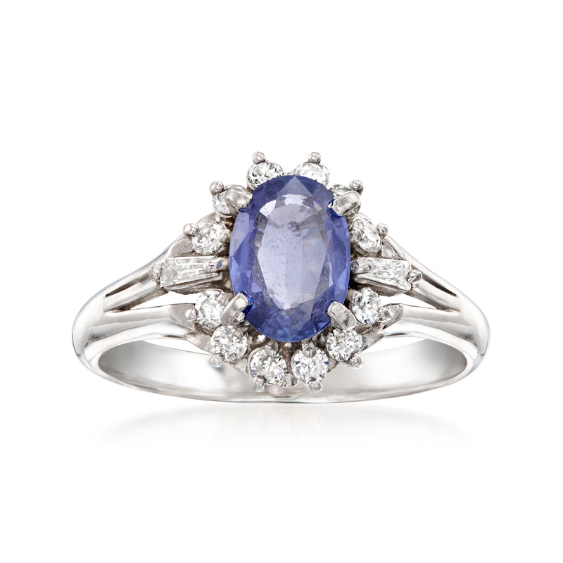 Platinum vintage sapphire oval ring with diamond halo and side accents