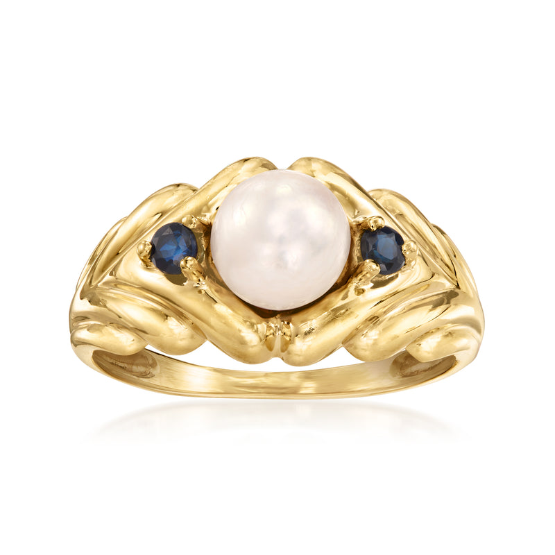 Vintage cultured pearl ring in yellow gold with two blue sapphire stones