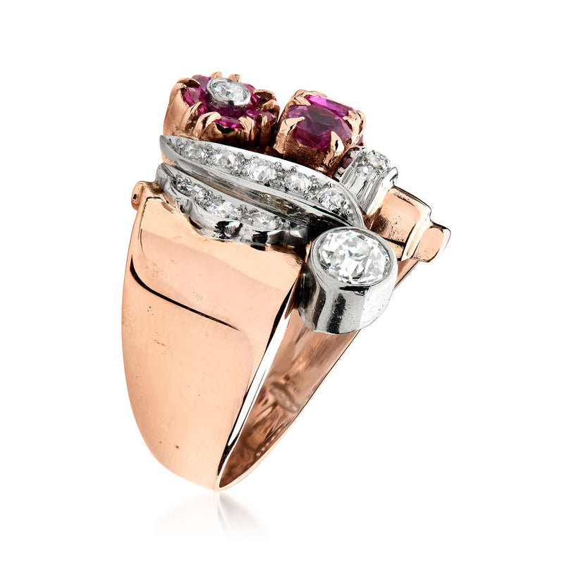Ruby and diamond flower ring in rose gold with platinum prongs and halo