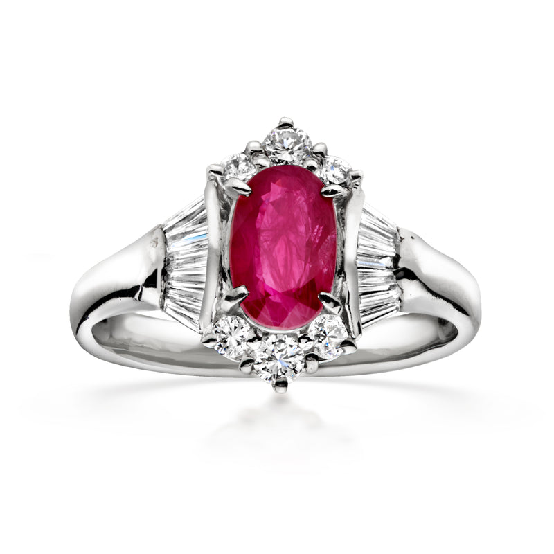 Platinum oval ruby ring with diamond accents, vintage-style halo setting