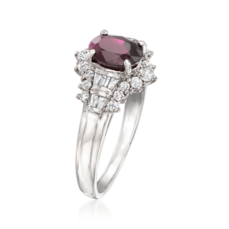 Platinum oval ruby ring with halo of round diamonds and cathedral-style side details
