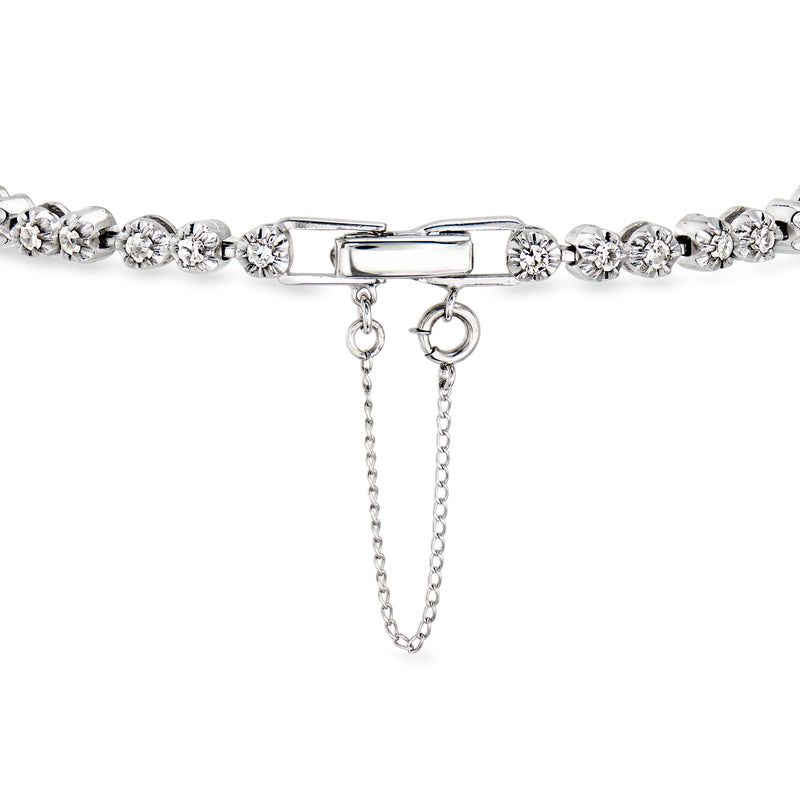 Diamond tennis bracelet in white gold with box clasp and dangling chain