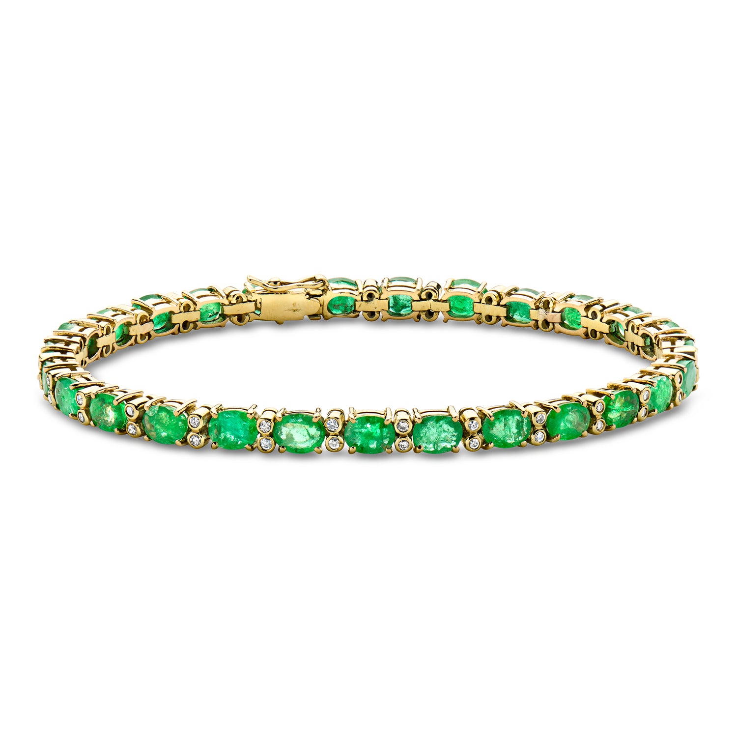 C. 1980 Vintage 9.45 ct. t.w. Emerald Bracelet with .60 ct. t.w. Diamonds in 18kt Yellow Gold