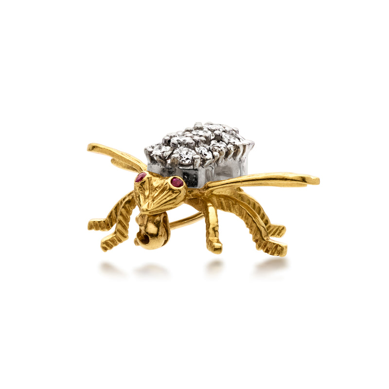 Yellow gold diamond bee pin with ruby eyes, side view showing wings and body