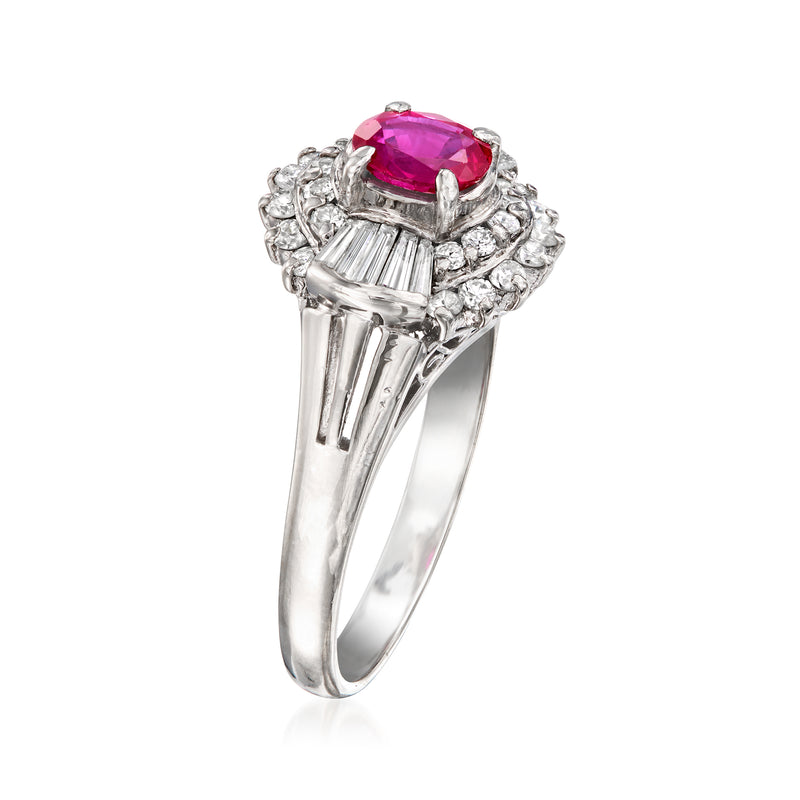 Platinum vintage ruby ring with round pink center and baguette diamond sides