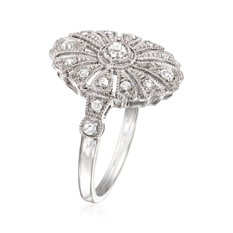 Platinum diamond filigree vintage ring with round center stone, openwork band