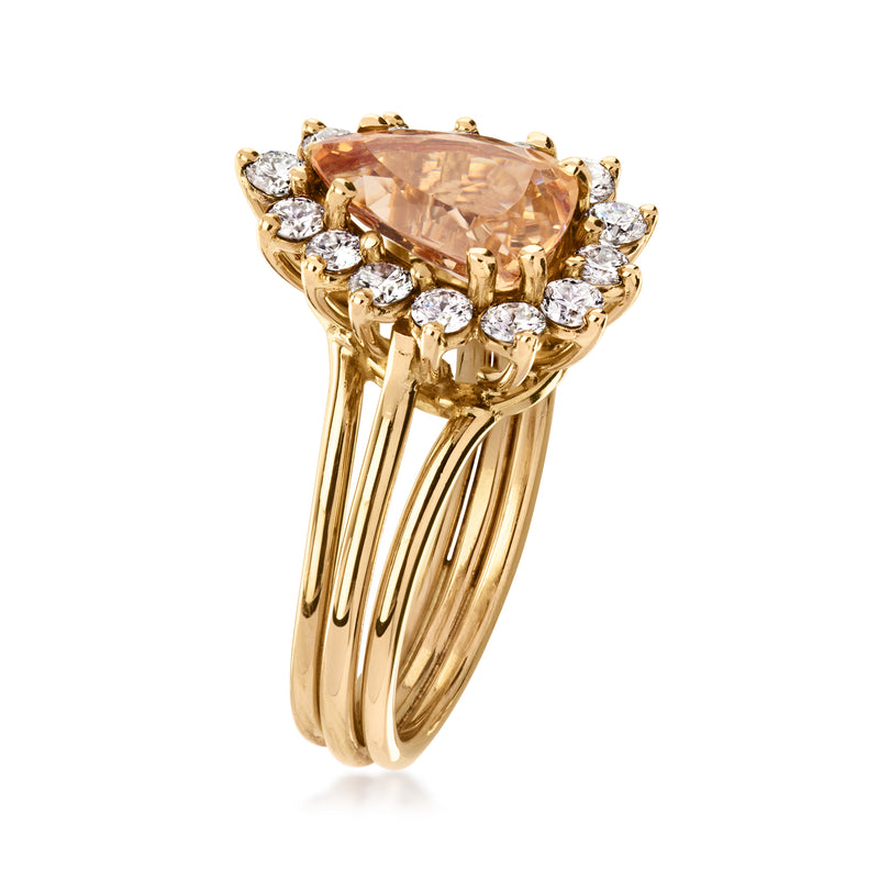 14kt yellow gold ring, pear orange topaz in front with round diamond accents