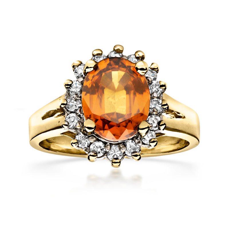 Vintage oval orange zircon halo diamond ring in 14kt yellow gold, size 7