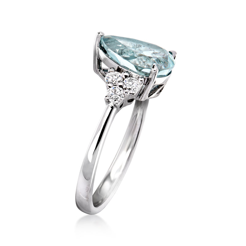 Platinum ring with raised aquamarine and diamond side clusters