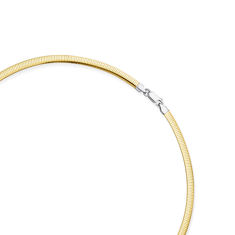 Omega necklace clasp detail: gold-plated links with silver-toned connector