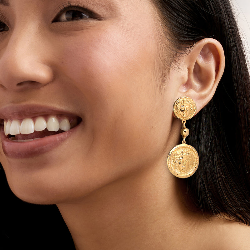 Yellow gold-tone coin drop earrings with face medallions and small bead drops