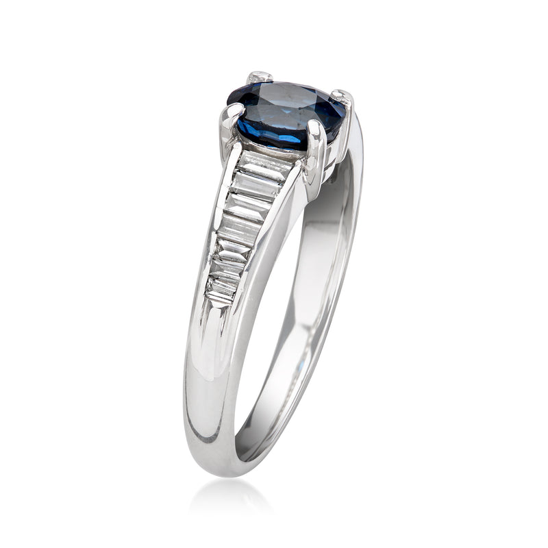 Platinum vintage ring with oval blue sapphire and baguette diamond side accents