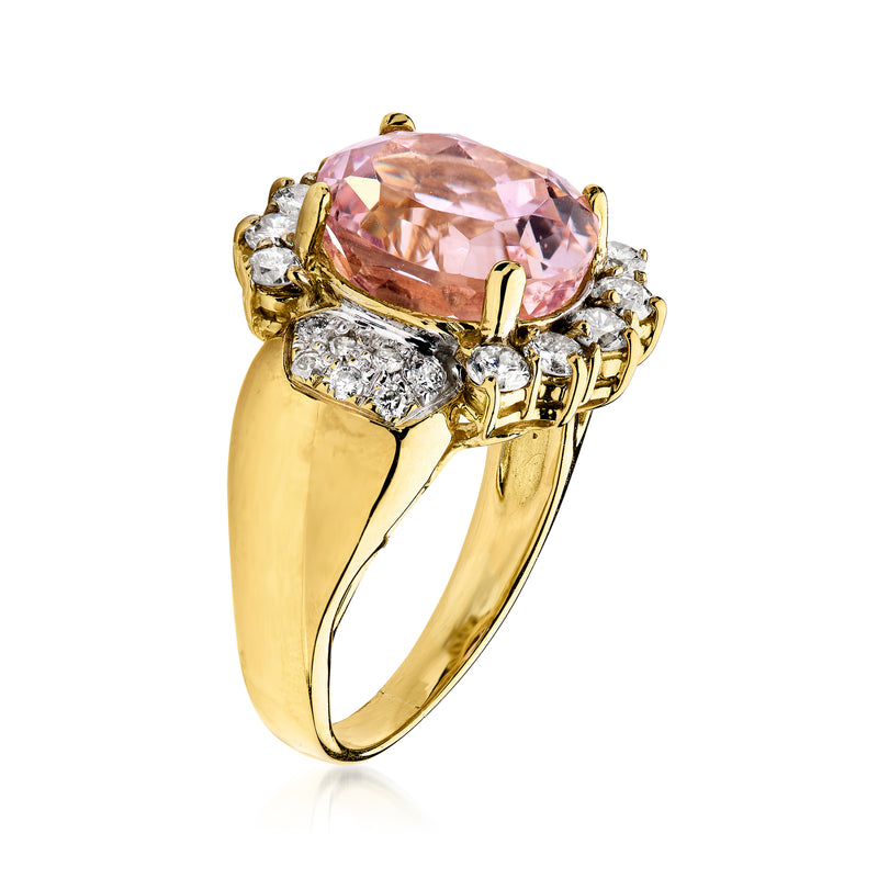 18kt yellow gold ring with large pink oval gemstone and diamond side clusters