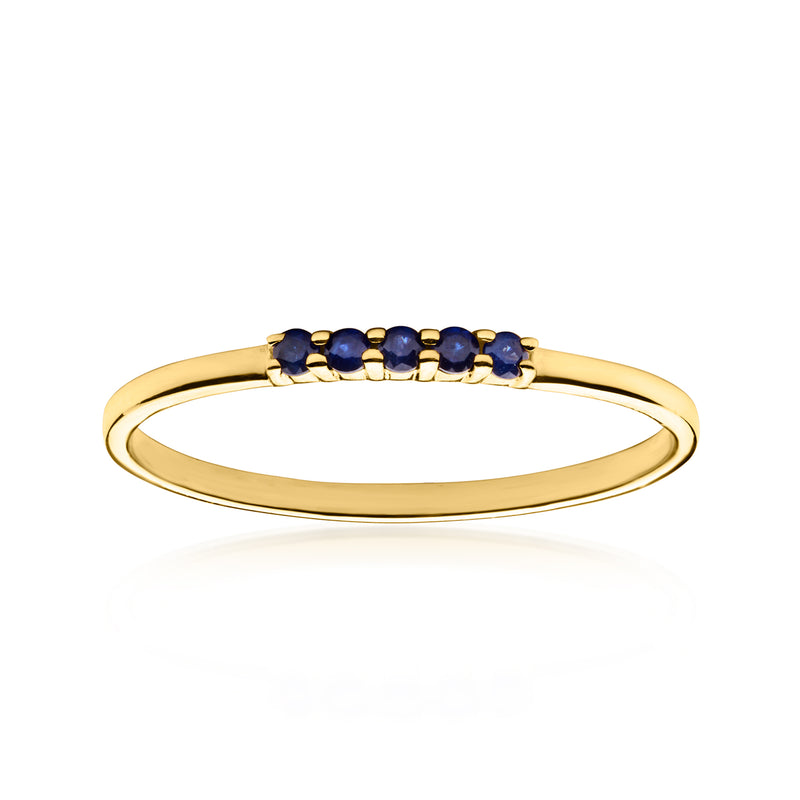 10kt yellow gold sapphire ring with five deep blue stones in a row