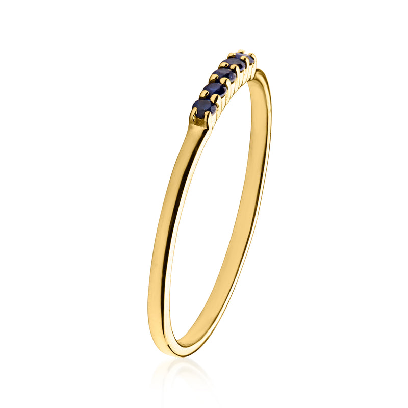 Slim 10kt yellow gold sapphire ring with dark blue stones along the top