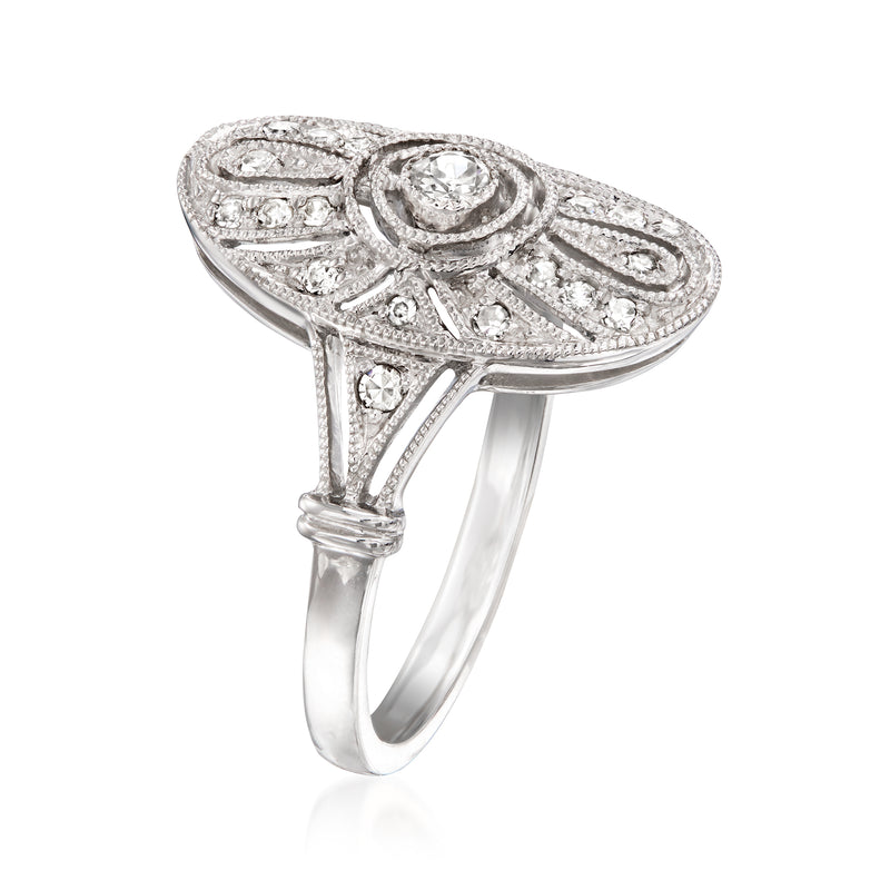 Platinum diamond filigree ring side view with engraved scrollwork and halo setting