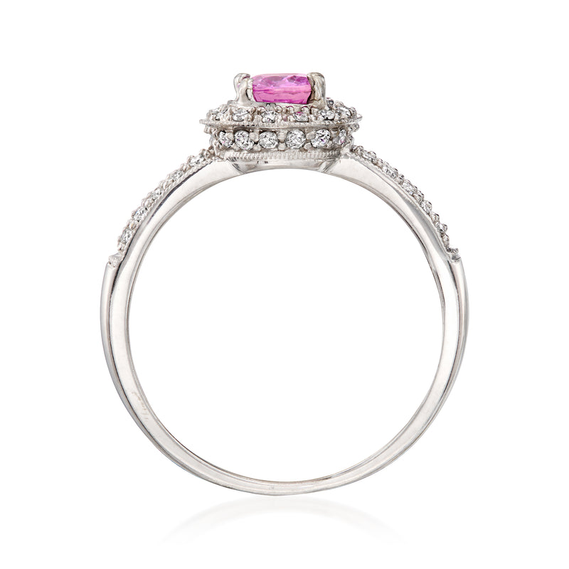 Vintage white gold ring with pink sapphire and diamond halo