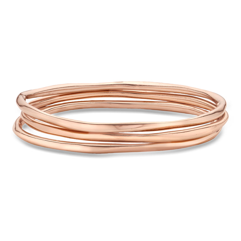 Three rose gold bangles, stacked oval open cuff design