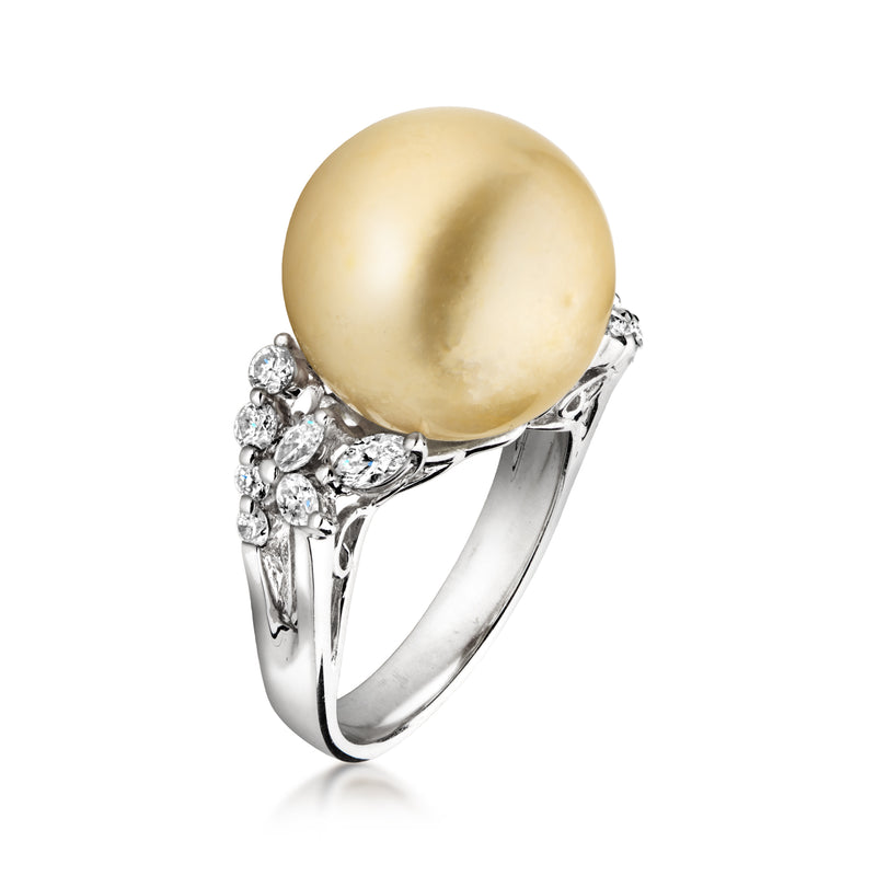 White gold pearl ring with golden center pearl and clustered diamond accents