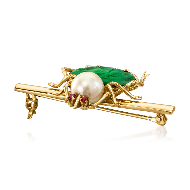 Vintage beetle lapel pin in 14kt yellow gold with pearl body, green jade wings, ruby eyes
