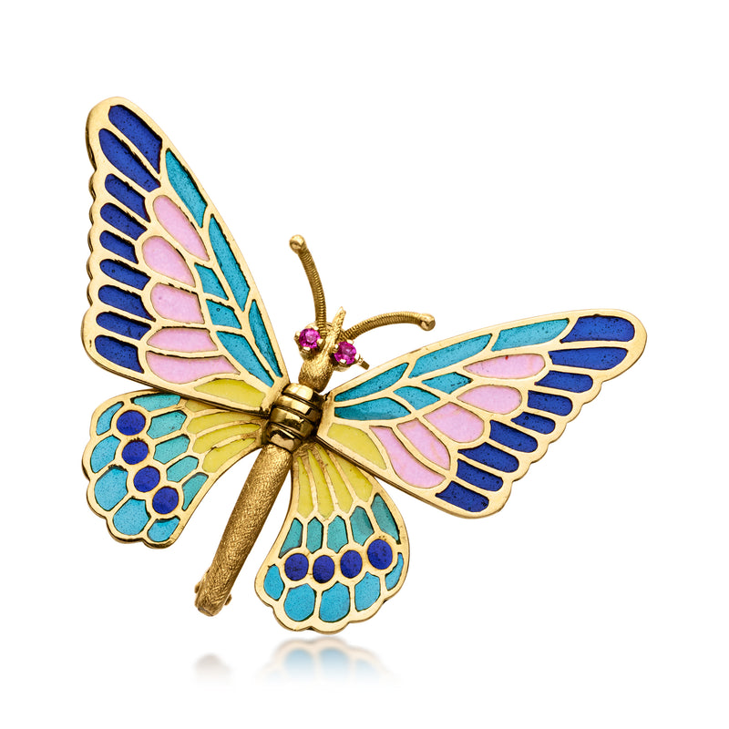 Butterfly enamel pin in gold with multicolor wings and purple gemstone