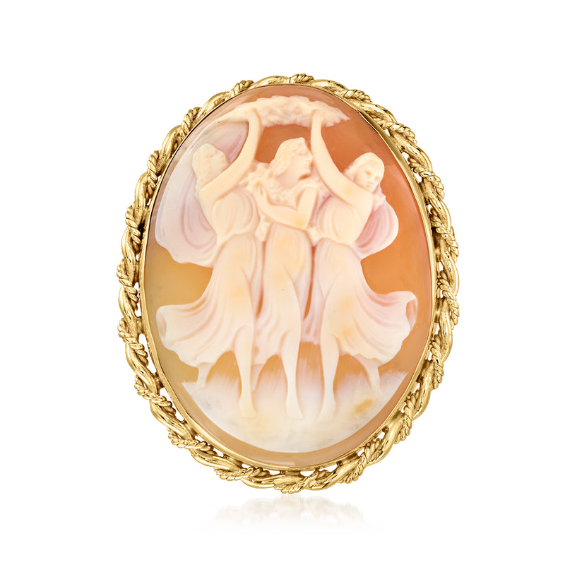 Oval cameo pendant in 14kt yellow gold with three figures in orange shell relief