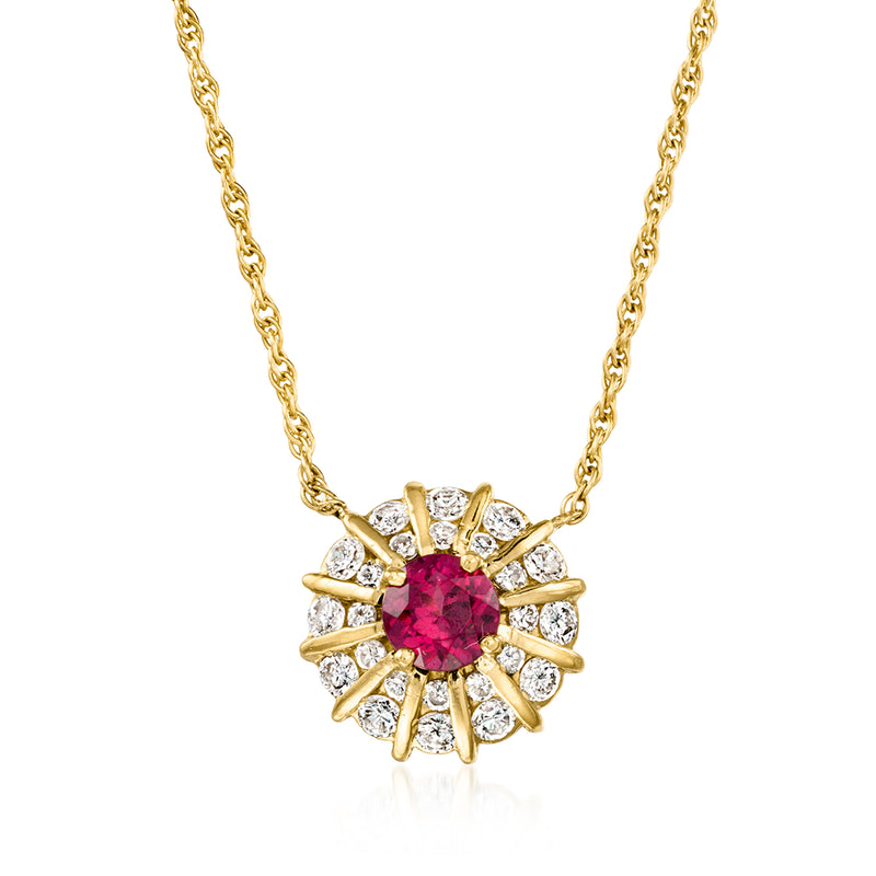14kt yellow gold necklace with pink rhodolite center and diamond halo pendant