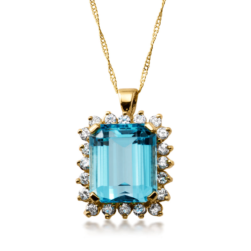 Gold pendant necklace with blue topaz center stone and diamond halo, on chain