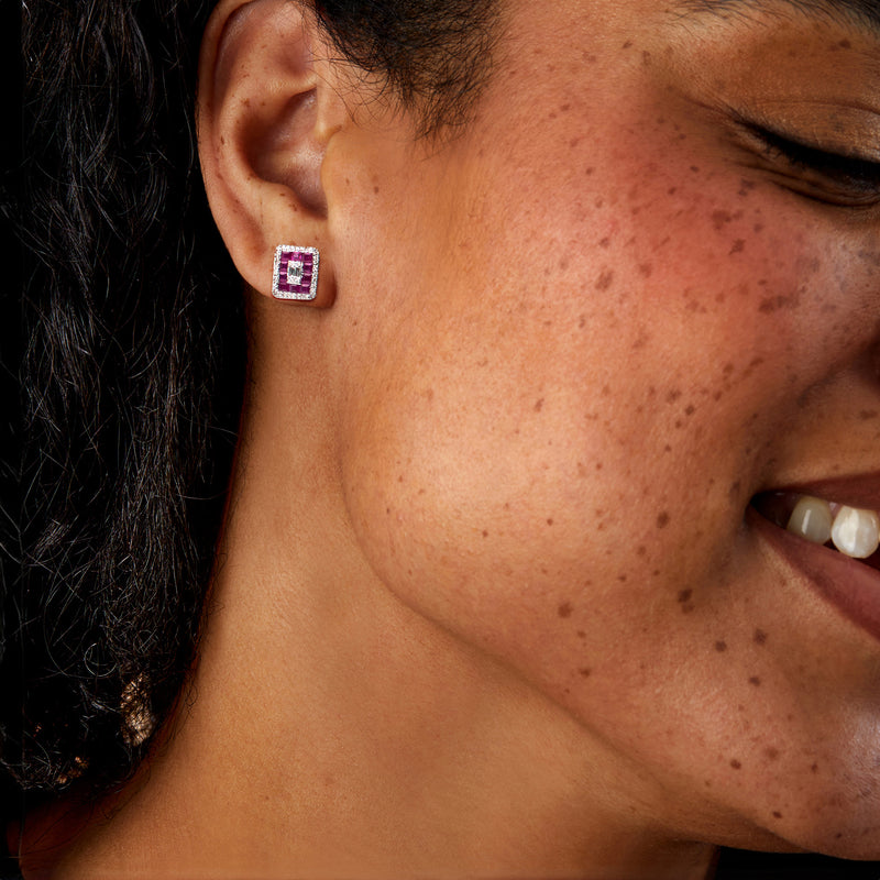 Ruby and diamond square stud earrings on model, pink center stones with diamond halo, post back