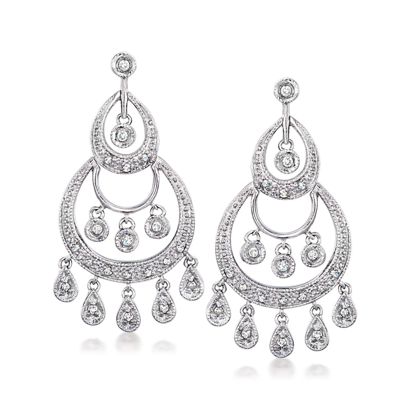 Diamond chandelier earrings in white gold with teardrop drops and post backs.