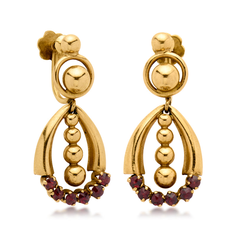 Yellow gold clip earrings with teardrop frame, beaded drops, and dark red garnet clusters
