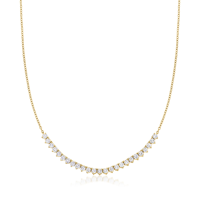 Gold tennis-style diamond necklace with round stones in a curved row