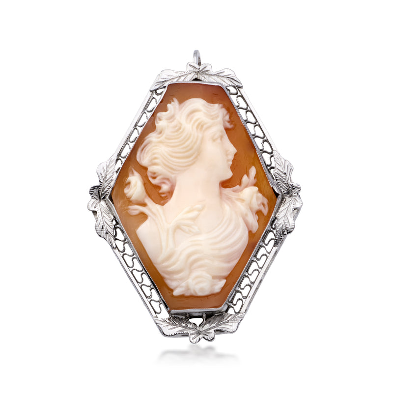 Vintage cameo shell pendant in white gold frame, dark brown backing and profile relief
