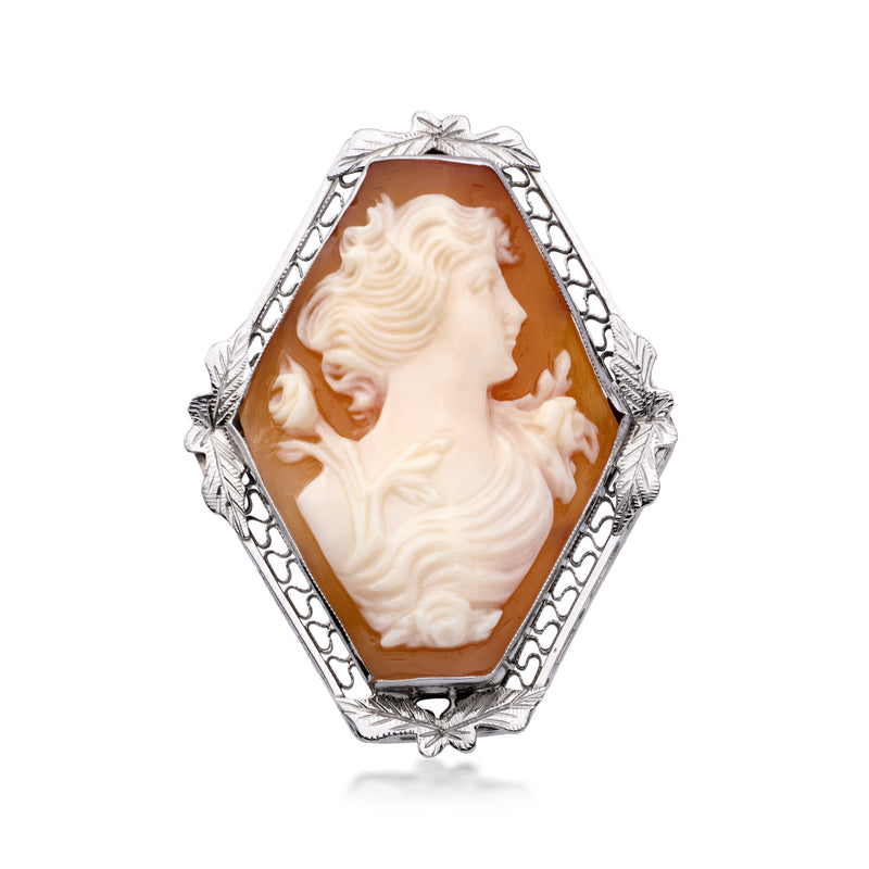 Vintage cameo shell pendant with filigree border and bow top bail, white gold tone