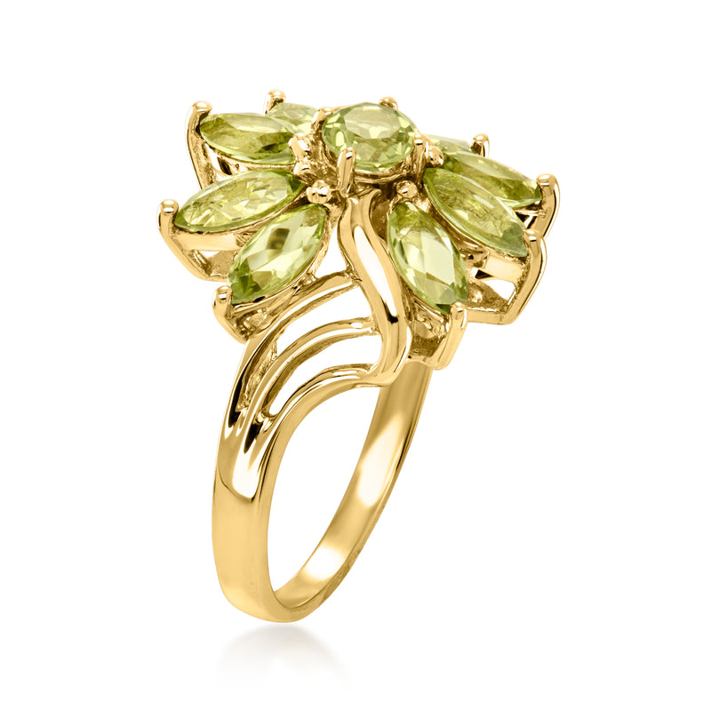 Yellow gold peridot flower ring with raised marquise green gemstones, curved band