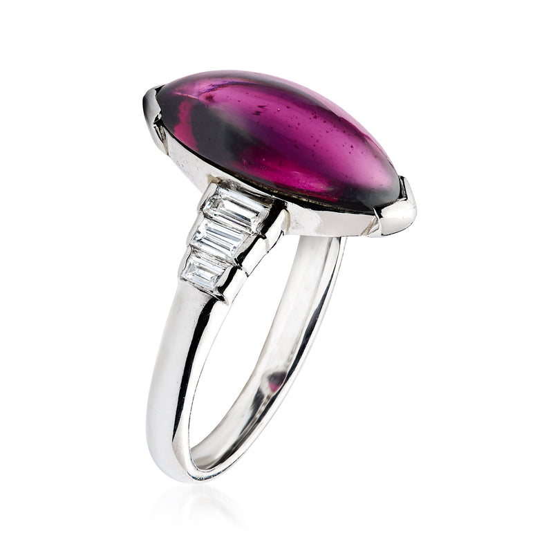 Platinum navette garnet ring with baguette diamond side settings