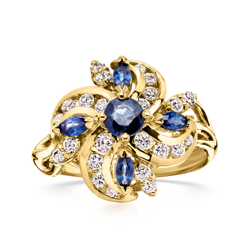 14kt yellow gold swirl ring with blue sapphires and white diamonds, ornate flower setting