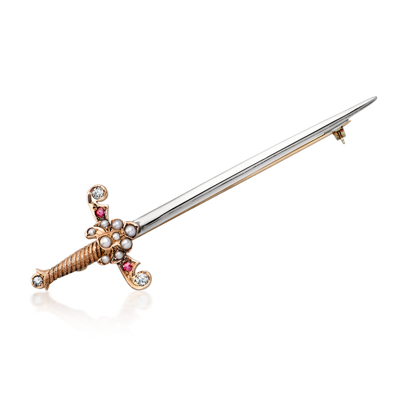 Platinum sword pin with cultured pearl center, diamond accents, simulated red gem details