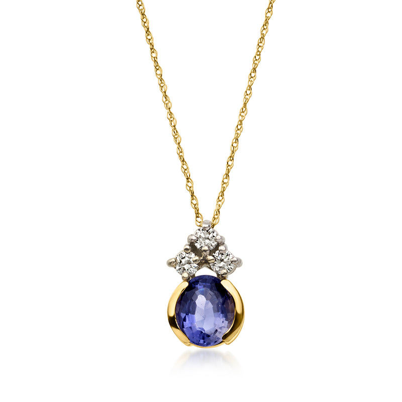 14kt yellow gold iolite pendant necklace with oval blue gemstone and diamond cluster